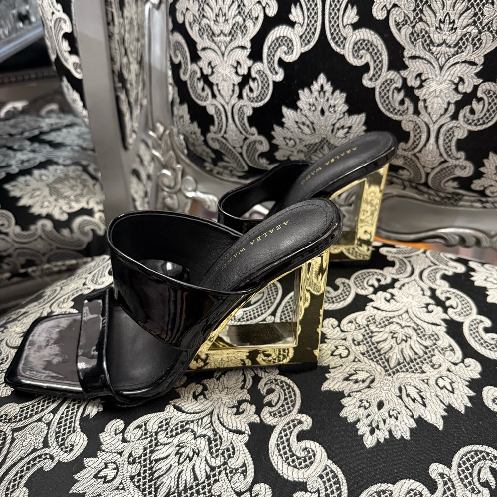 Elegant Black and Gold Heels